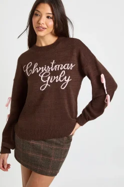Pull de Noël à nœud féminin