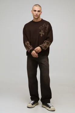 Pull en maille oversize au design boxy et graphique croisé