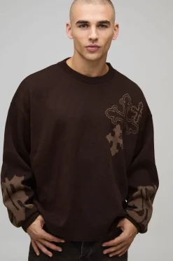 Pull en maille oversize au design boxy et graphique croisé