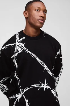 Pull surdimensionné à la coupe boxy en jacquard tricoté à motif de fil barbelé