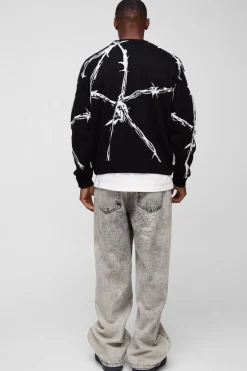 Pull surdimensionné à la coupe boxy en jacquard tricoté à motif de fil barbelé