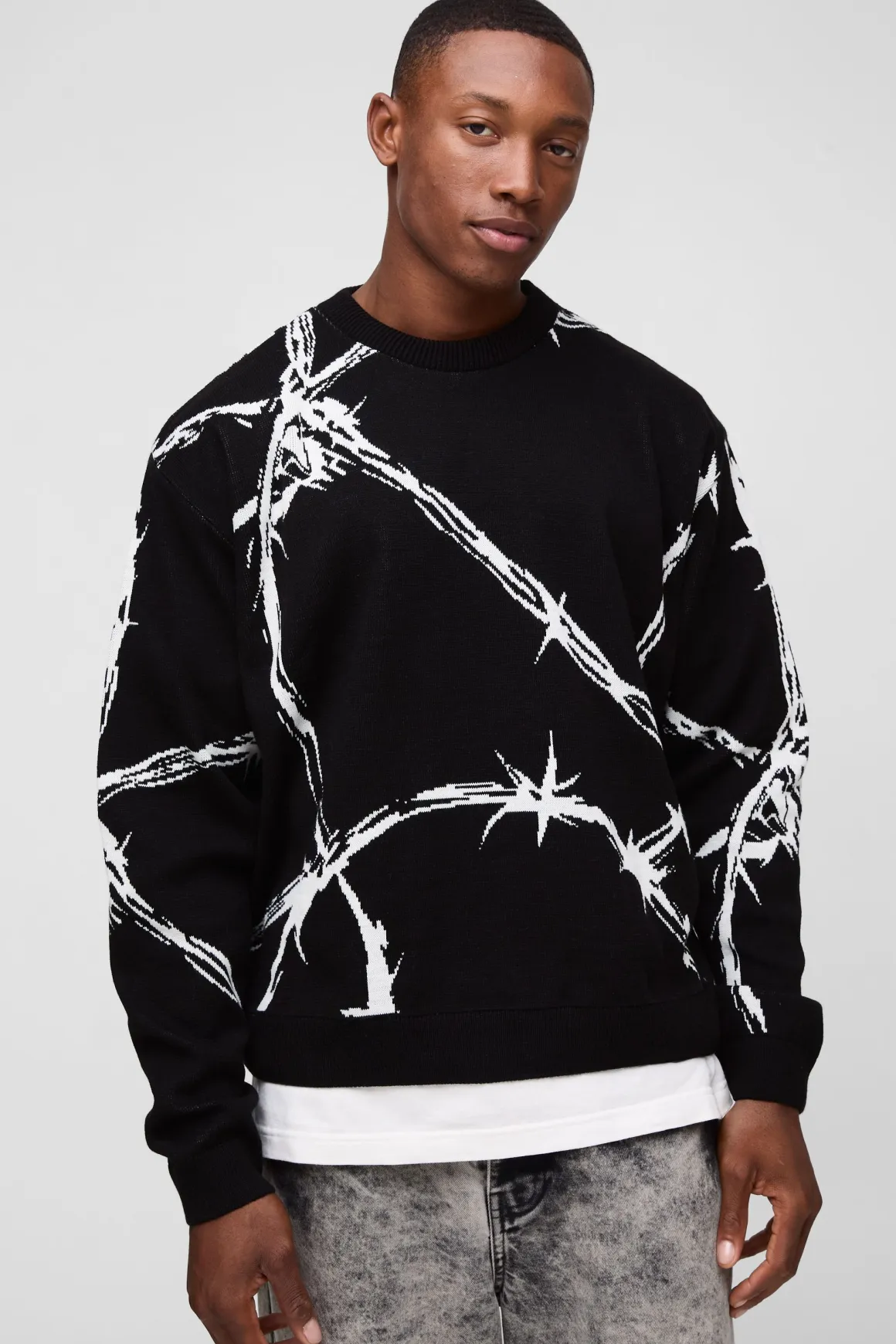 Pull surdimensionné à la coupe boxy en jacquard tricoté à motif de fil barbelé