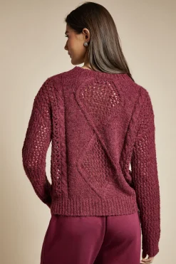 Pull surdimensionné tricoté avec un détail en torsades