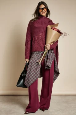 Pull surdimensionné tricoté avec un détail en torsades