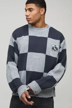 Pull tricoté ample et de coupe carrée, usé et à motif damier