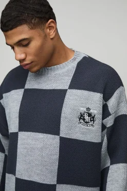 Pull tricoté ample et de coupe carrée, usé et à motif damier