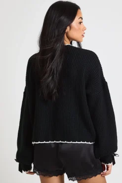 Pull tricoté avec détails de poignets à nœud