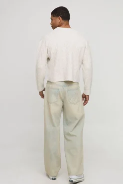 Pull tricoté à motif torsadé, à la coupe boxy, court et à encolure étendue