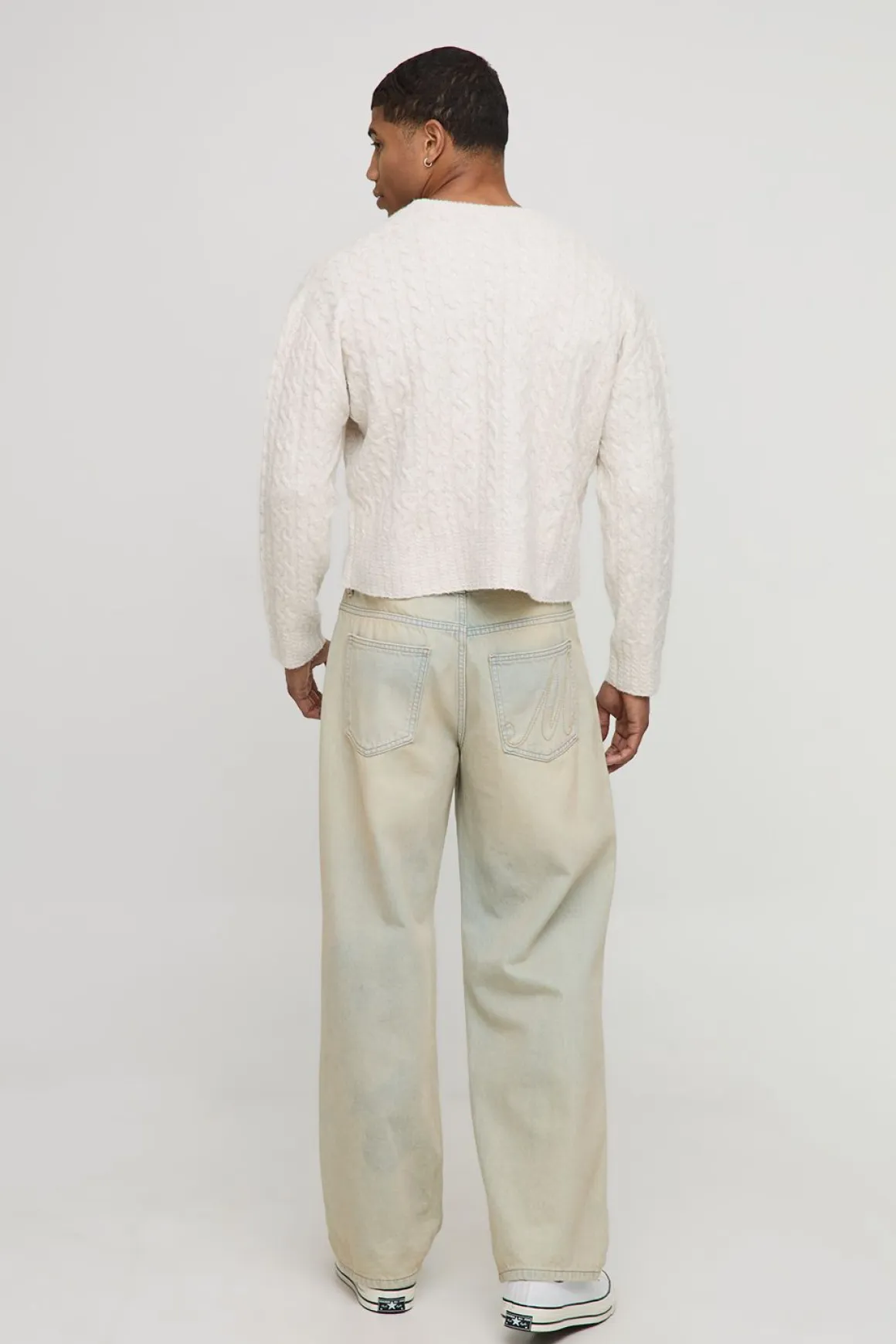 Pull tricoté à motif torsadé, à la coupe boxy, court et à encolure étendue