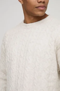 Pull tricoté à motif torsadé, à la coupe boxy, court et à encolure étendue