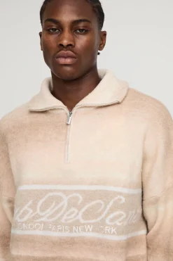 Pull tricoté oversize à coupe carrée, rayures ombrées graphiques, col entonnoir