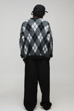 Pull tricoté surdimensionné et long à motif diamant argyle