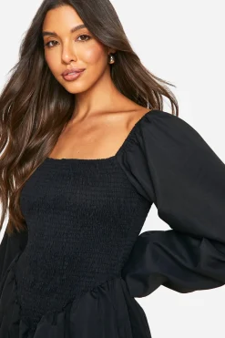 Robe babydoll froncée à manches longues