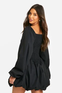Robe babydoll froncée à manches longues