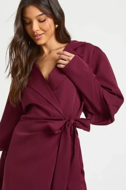 Robe blazer à manches volumineuses et taille nouée
