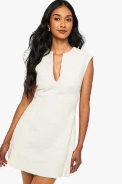 Robe chemise ajustée en bouclé à encolure V
