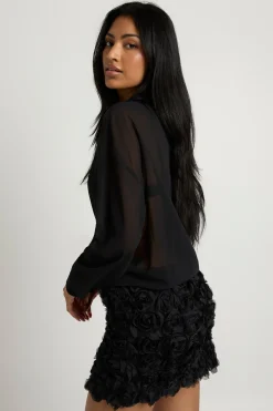 Robe-chemise transparente à détail rose