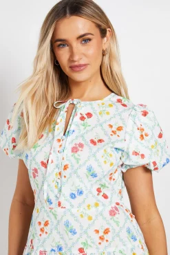 Robe Courte À Manches Bouffantes Avec Détail Boutonné Et Nœud Devant