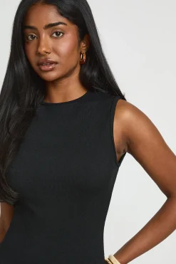 boohoo Robe Courte Sans Manches Côtelée À Jupe Évasée<Femme Robes Patineuses|Robes