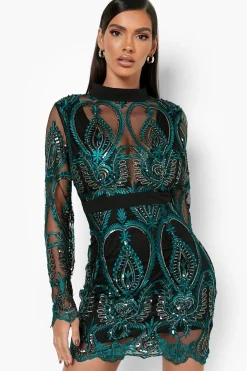 Robe de fête mini en sequins damassé à coupe galbante