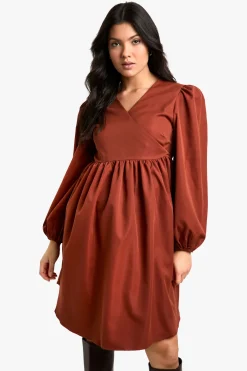 Robe de maternité tissée à manches longues enveloppante smockée