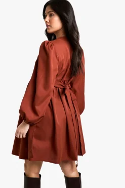 Robe de maternité tissée à manches longues enveloppante smockée