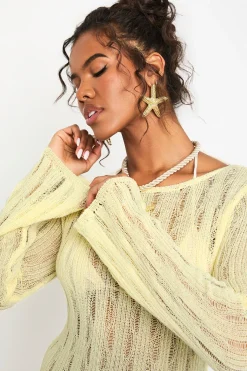 Robe de plage en crochet à manches longues avec dos échancré