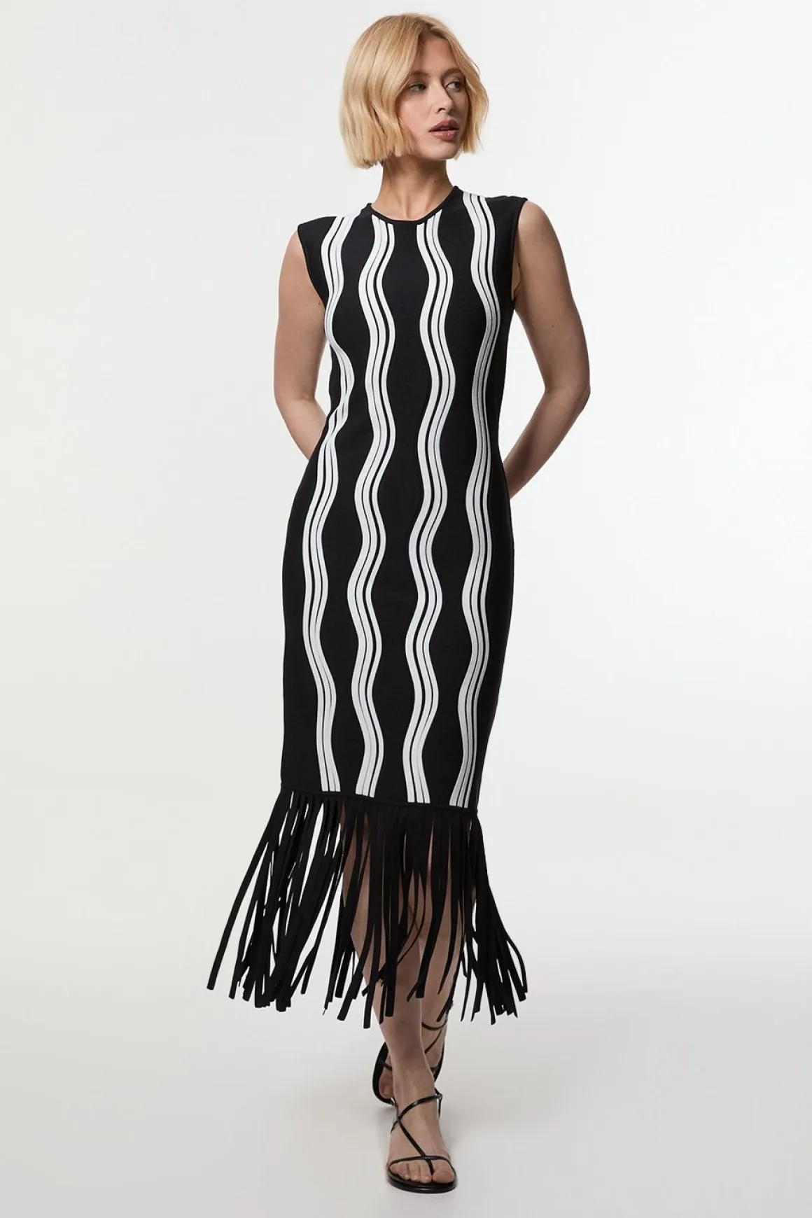 Robe en maille à vagues contrastées avec franges