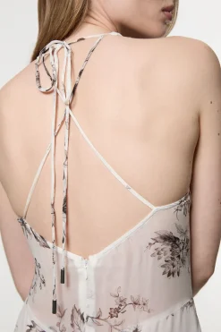 Robe en viscose georgette transparente à imprimé floral esquissé, décolleté en V profond, encolure halter, tissée.