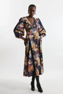 Robe maxi en dentelle ornée de fleurs