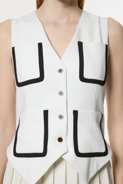 Robe midaxi ajustée sans manches en stretch compact plissée à liseré contrasté.