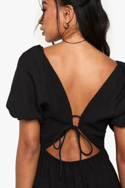 Robe midaxi en lin avec dos noué et manches bouffantes