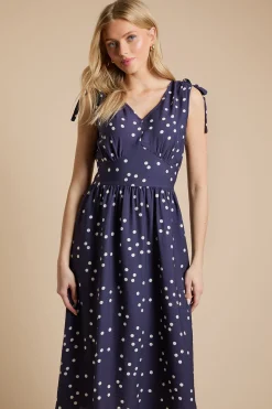 Robe Midi Bleu Marine À Pois Avec Encolure En V Et Liens D'épaule À Nouer