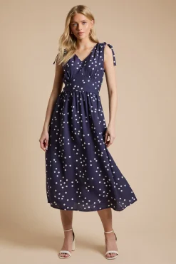 Robe Midi Bleu Marine À Pois Avec Encolure En V Et Liens D'épaule À Nouer