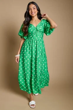 Robe Midi Petite À Pois Avec Détail Torsadé Devant Et Manches Bouffantes