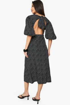 Robe midi à pois avec manches bouffantes et dos noué