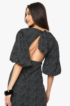 Robe midi à pois avec manches bouffantes et dos noué