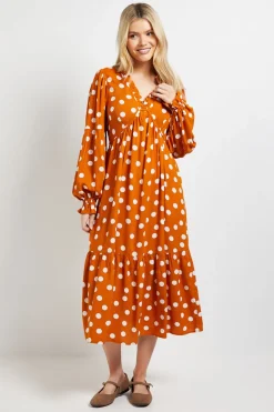 Robe Midi À Pois Orange Avec Couture Empire Et Détails À Volants
