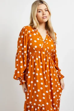 Robe Midi À Pois Orange Avec Couture Empire Et Détails À Volants