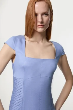 Robe midi sur mesure en lin premium avec détails pintuck et jupe ample