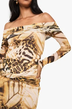 Robe mini Bardot en maille abstraite avec twist frontal