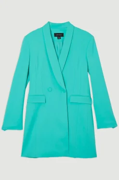 Robe mini blazer ajustée à double boutonnage avec détail cinché