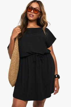 Robe mini en jersey côtelé à épaules dénudées et à taille nouée Plus