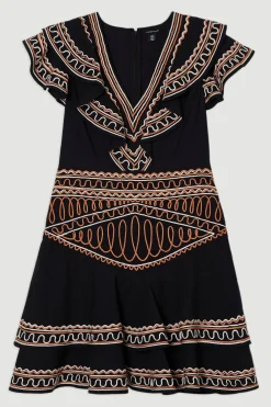 Robe mini en lin de coton brodé tissé à décolleté plongeant