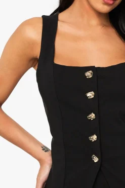 Robe mini gilet à boutons dorés
