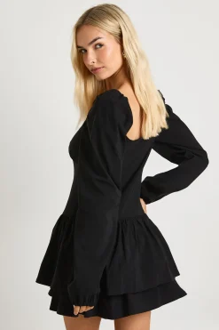 Robe mini à manches longues style laitière à volants