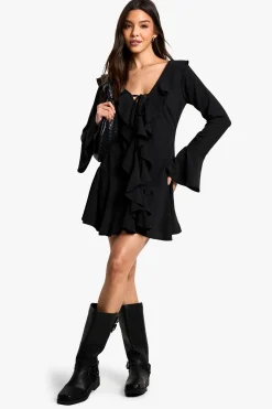 Robe mini à manches longues texturée à volants
