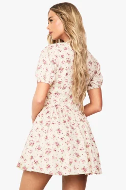 Robe mini paysanne à imprimé fleuri discret et manches bouffantes