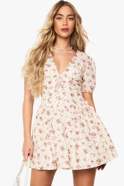 Robe mini paysanne à imprimé fleuri discret et manches bouffantes