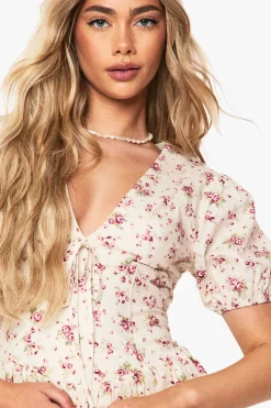 Robe mini paysanne à imprimé fleuri discret et manches bouffantes